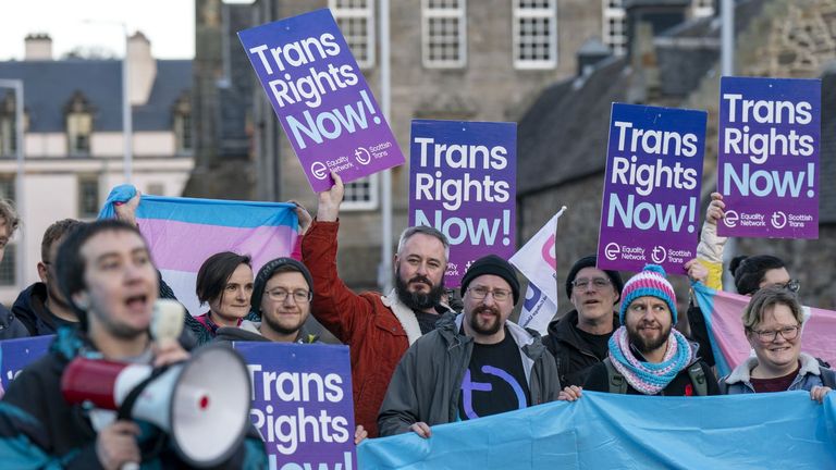 Supporters of the Gender Recognition Reform Bill protest outside the Scottish Parliament.