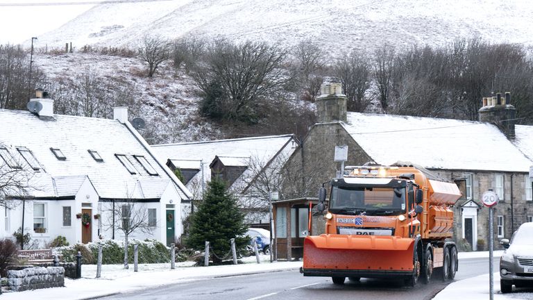 A snow plough makes its way through Carlops
