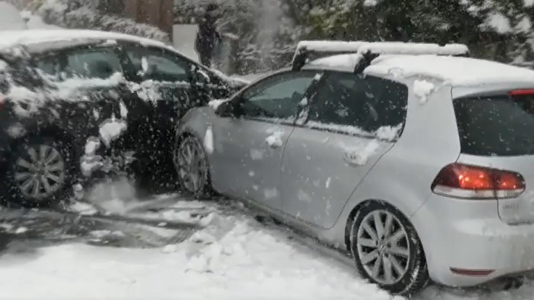 Drivers in Gloucestershire struggle in heavy snow and ice that has made some roads extremely slippery.