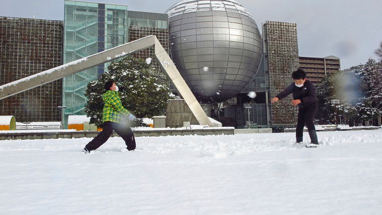 The white snow covers the ground in Nagoya City, Aichi Prefecture on December 24, 2022.( The Yomiuri Shimbun via AP Images )