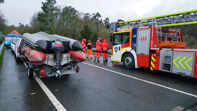 Crane of the firefighters and boats of the Special Group of Underwater Activities of the Civil Guard (GEAS) involved in the search and rescue of the missing passengers of the bus that has fallen into the river L..rez , on December 25, 2022, in the concello of Cerdedo-Cotobade, Pontevedra, Galicia, (Spain). Yesterday around 21.30 hours a coach of the regular line Vigo-Lugo, of the company Monbus, fell from a bridge 40 meters over the river L..rez, firefighters rescued last night the driver, a passenger and two deceased passengers, in the bus were traveling 9 people passengers, this morning another person was found dead and 4 people remain missing. The abundant flow of the river stopped the search work during the night which has been resumed today. 25 DECEMBER 2022;EVENT;RAIN;ACCIDENT;RIVER;EMERGENCY;RESCUE;112;ROAD;CONE C..sar Arxina / Europa Press 12/25/2022 (Europa Press via AP)