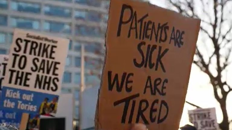Ashish Joshi talks to striking nurses outside St Thomas' hospital in London
