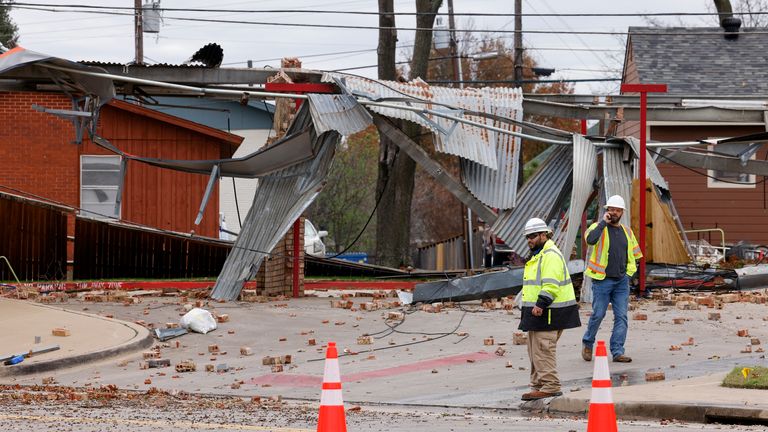 Crews survey damage from a possible tornado in Grapevine, Texas, Tuesday, Dec. 12.  13th, 2022.  (El..as Valverde II/The Dallas Morning News via AP)