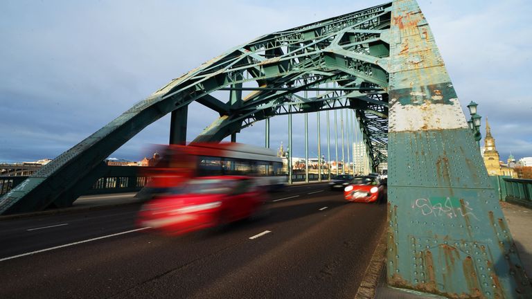Traffic passing through the Tyne Bridge with rust clearly visible. Newcastle City Council has said the rusting Tyne Bridge was a metaphor of the damage caused by Tory austerity since 2010 and would have been repaired if it was in the South East. The national landmark, a symbol of civic pride for the North East of England, has been scheduled to have major refurbishment for years. Picture date: Wednesday December 15, 2021.