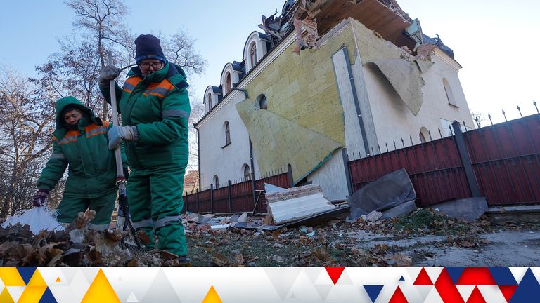 Municipal workers remove debris outside a building on the premises of a local church, which was damaged in shelling in the course of Russia-Ukraine conflict in Donetsk, Russian-controlled Ukraine, December 5, 2022. REUTERS/Alexander Ermochenko