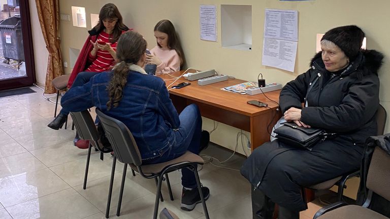 Blackout in Odesa, Ukraine - people charge their phones at "points of invincibility" – dedicated buildings such as train stations, schools and other facilities with a more guaranteed supply of electricity and warmth