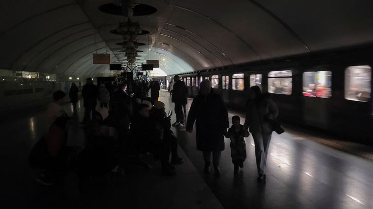 People shelter inside a metro station during partial power outage amid massive Russia&#39;s missile attacks in Kyiv, Ukraine