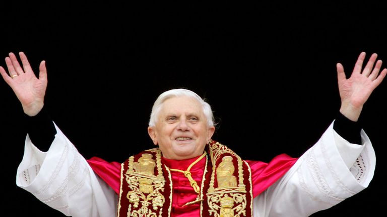 Pope Benedict XVI, Cardinal Joseph Ratzinger of Germany, waves from a balcony of St. Peter&#39;s Basilica in the Vatican 