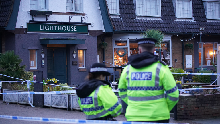 Police officers on duty at the Lighthouse Inn in Wallasey Village, near Liverpool, after a woman died and multiple people were injured in a shooting incident on Christmas Eve. Merseyside Police said officers were called to the pub on Saturday following reports of gunshots. A young woman was taken to hospital with an injury consistent with a gunshot wound and later died. Picture date: Sunday December 25, 2022.