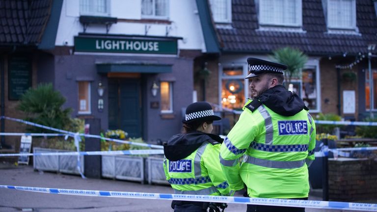 Police officers on duty at the Lighthouse Inn in Wallasey Village, near Liverpool, after a woman died and multiple people were injured in a shooting incident on Christmas Eve. Merseyside Police said officers were called to the pub on Saturday following reports of gunshots. A young woman was taken to hospital with an injury consistent with a gunshot wound and later died. Picture date: Sunday December 25, 2022.