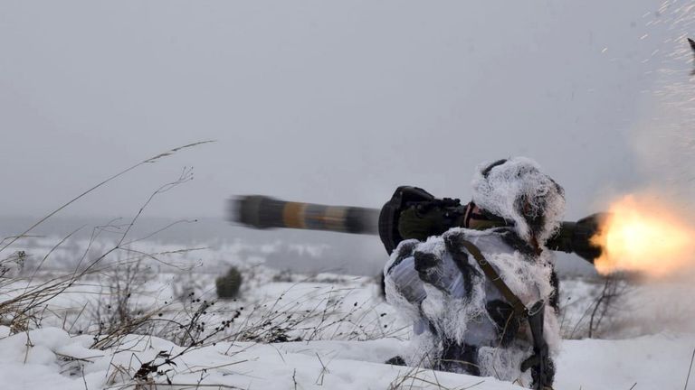 Ukrainian service members use NLAW missiles during drills in the Lviv region