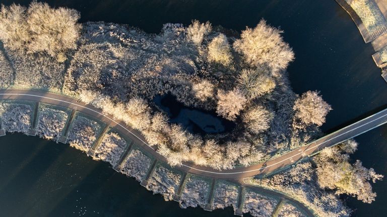 Frozen ground and vegetation by the river Avon in Warwick. The Met Office has issued a number of weather warnings for snow and ice for parts of Scotland, Northern Ireland, Wales and the east coast and south-west England over the coming days. Picture date: Thursday December 8, 2022.