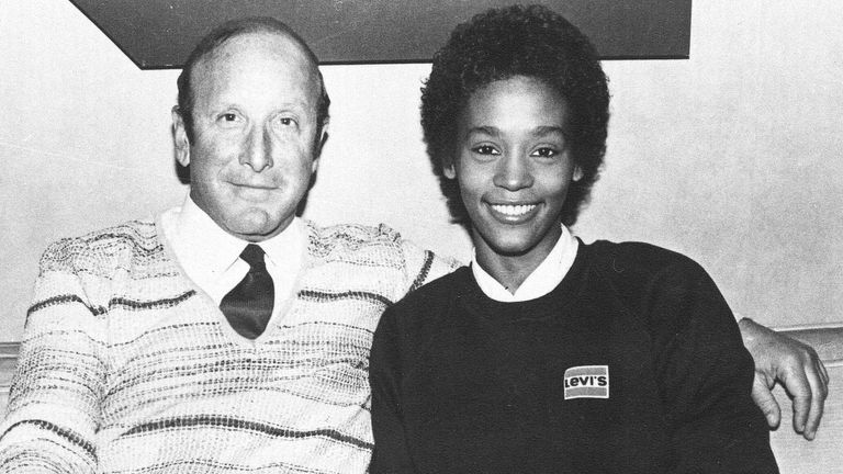 Whitney Houston pictured with music producer Clive Davis in 1983, shortly after signing a contract with Arista Records. Pic: AP

