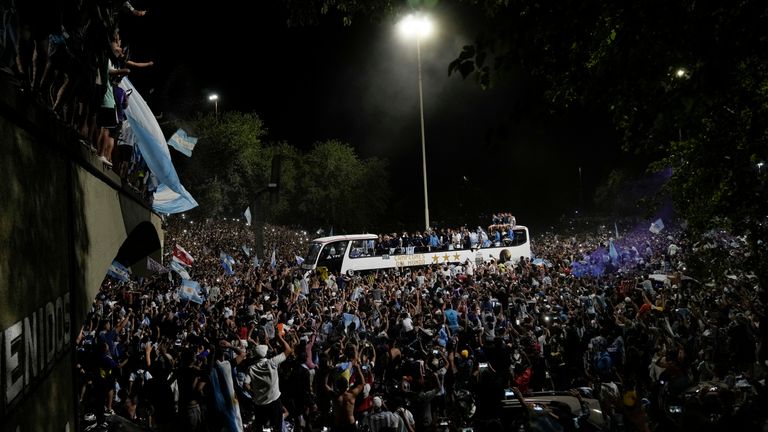 The team received a warm welcome home - with thousands gathering on the streets in celebration. Pic: AP