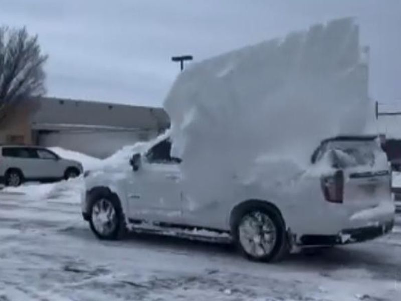 Buffalo Bills players and staff returned to Buffalo to find their vehicles buried in deep snow following a blizzard