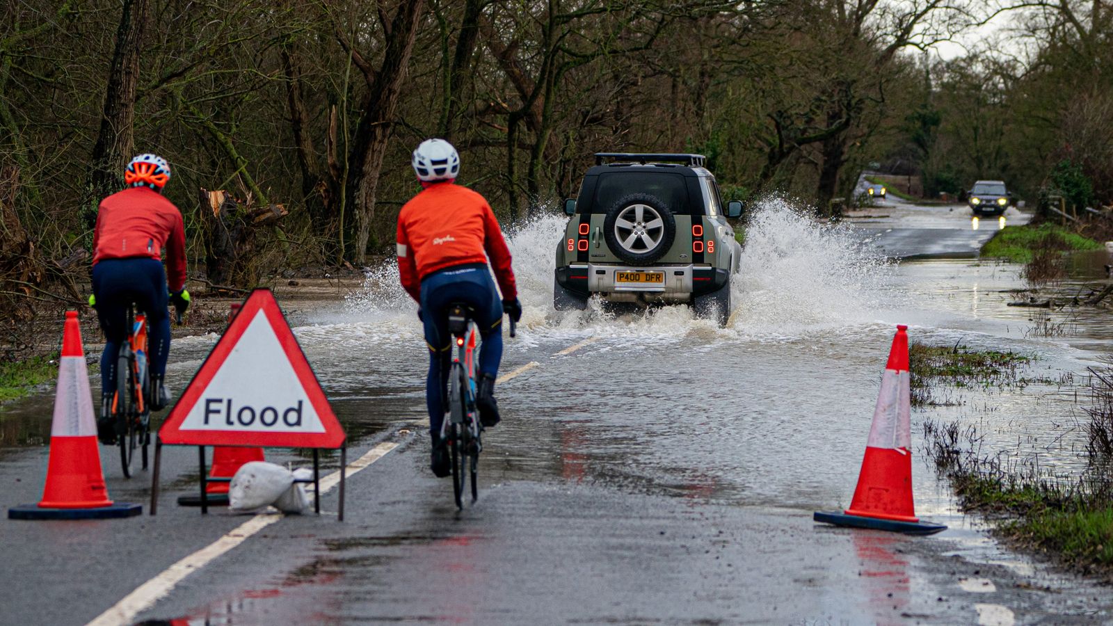 UK weather: Flood warnings as temperatures fall - leading to snow, sleet and ice in parts