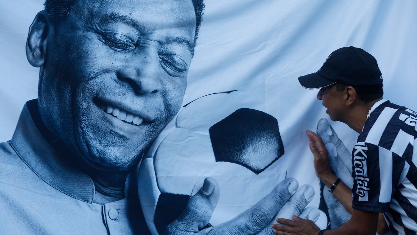 Fans in their thousands queue to see hero Pele's coffin - ahead of its unusual final resting place