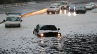 Vehicles are stranded by flood water in Auckland, Saturday, Jan 28, 2023. Record levels of rainfall pounded New Zealand&#39;s largest city, causing widespread disruption. (Dean Purcell/New Zealand Herald via AP)
