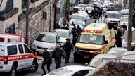 Security and rescue personnel work at a scene where a suspected incident of shooting attack took place, police spokesman said, just outside Jerusalem&#39;s Old City January 28, 2023. REUTERS/Ammar Awad