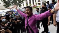 Rappler CEO and Nobel Laureate Maria Ressa gestures after a Manila court acquitted her from a tax evasion case, outside the Court of Tax Appeals in Quezon City, Philippines, January 18, 2023. 