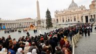 Faithful queue to enter St. Peter’s Basilica to pay homage to former Pope Benedict at the Vatican, January 2, 2023. REUTERS/Ciro De Luca
