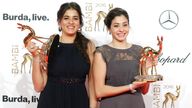 Yusra (R) and Sarah at the annual Bambi awards ceremony in Berlin in 2016 Pic: AP 
