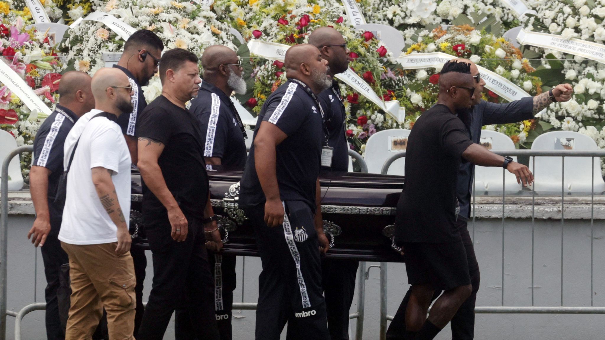 Pele's coffin carried to stadium as Brazil bids farewell to football icon |  World News | Sky News