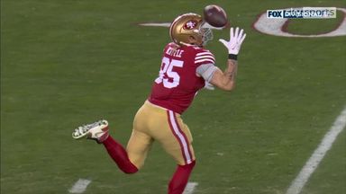 Kittle makes incredible one-handed 'circus' catch off helmet!