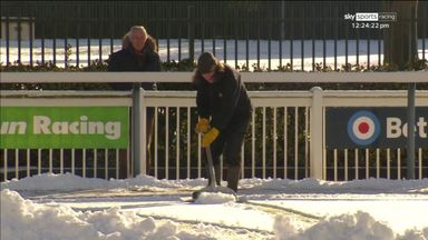 Sky Sports reporter helps clear ice as Wolverhampton survives frost!