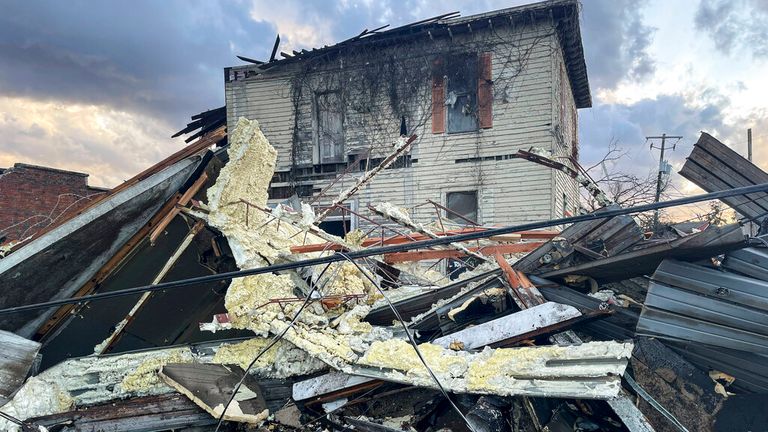 Damaged structures and debris can be seen after severe weather on Thursday, Jan. 1.  12, 2023, Selma, Alabama. A large tornado damaged homes and uprooted trees in Alabama as a powerful storm system swept across the South on Thursday.  (AP Photo/Butch Dill)