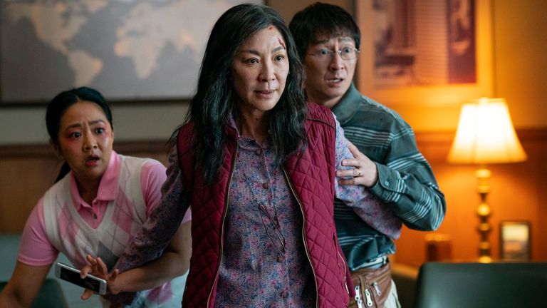 Michelle Yeoh, Ke Huy Quan and Stephanie Hsu in Everything everywhere at once.  photo: A24