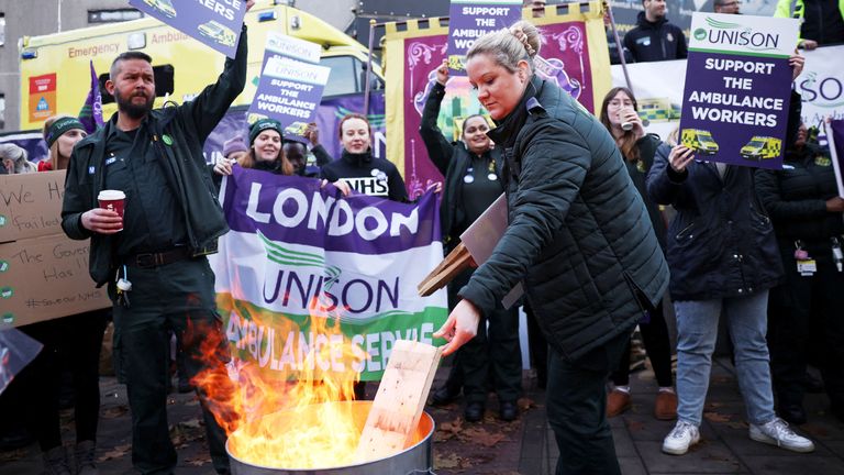 Ambulance workers take part in a strike, amid a dispute with the government over pay, outside NHS London Ambulance Service in London 