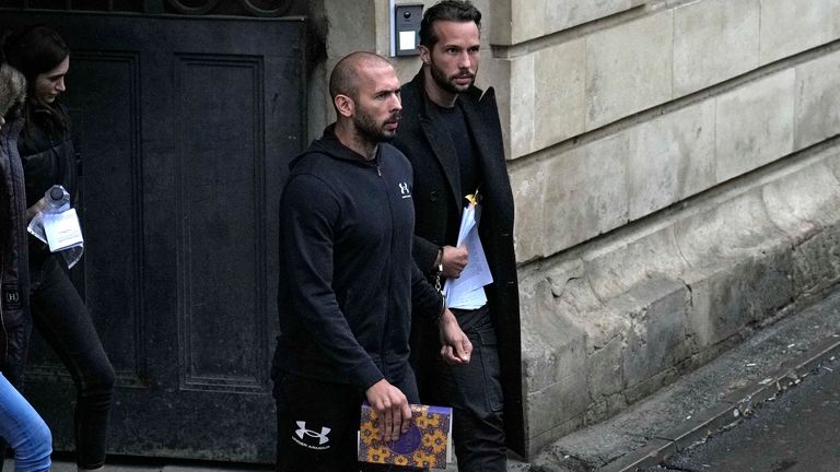 Andrew Tate  and his brother Tristan, leave after appearing at the Court of Appeal, in Bucharest, Romania 
PIC:AP