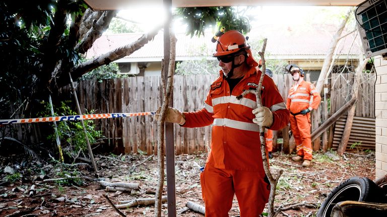 Members of the State Emergency Service repair damage while on deployment in the flood-hit Australian town of Broome.  Photo: Department of Fire and Emergency Services WA/Reuters