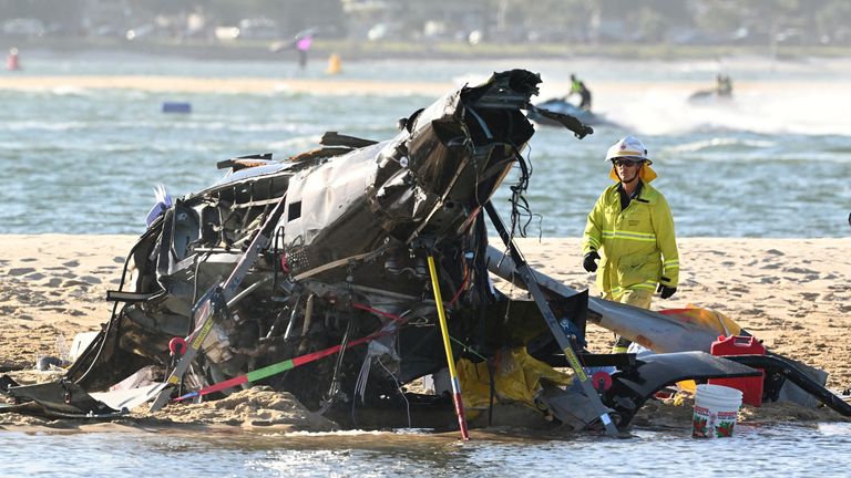 The aftermath of a helicopter collision is seen on the Gold Coast