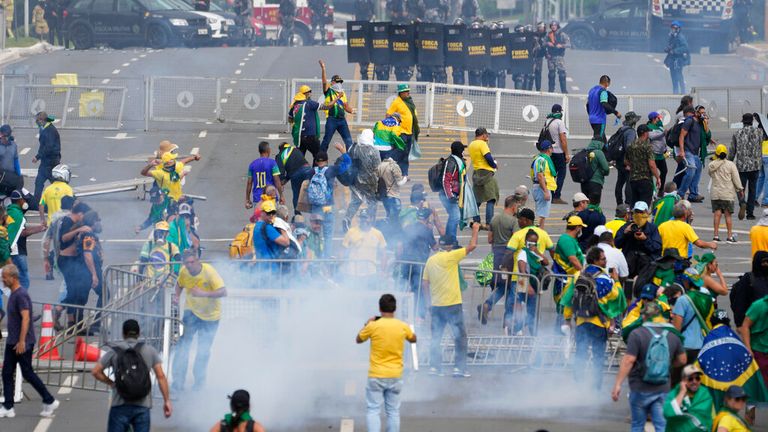 Supporters of former President Jair Bolsonaro clashed with police outside the Planalto Palace building