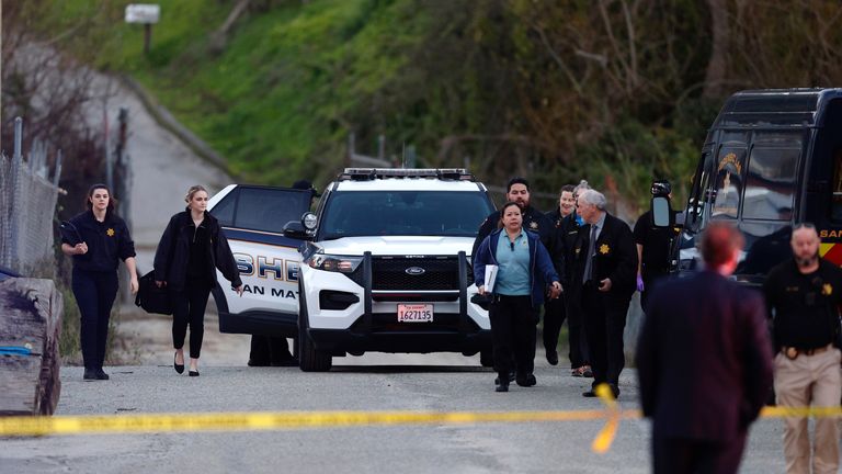 The San Mateo County Sheriff and emergency medical service personnel gathered on a road near where multiple people were shot on Monday.  Half Moon Bay, California, February 23, 2023.Image: San Francisco Chronicle/AP