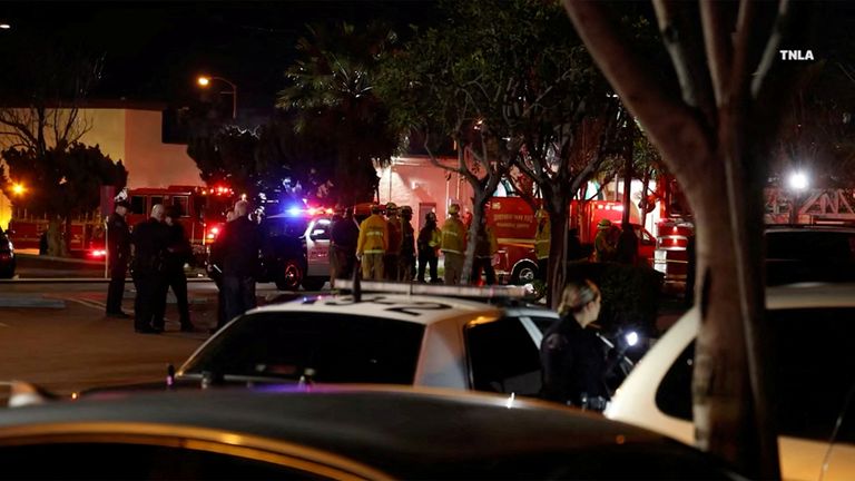 A still from video shows emergency responders at the scene of a shooting after a shooting in Monterey Park, California, U.S., January 22, 2023.  TNLA/Handout via Reuters, this image was provided by a third party.mandatory credit