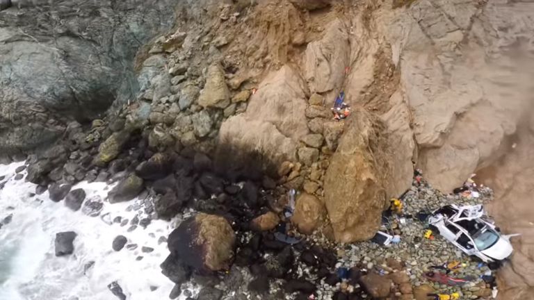 View from the helicopter during a rescue operation after a vehicle carrying two adults and two children went over a cliff in Devil's Slide, San Mateo county, California