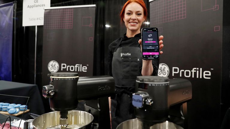 Chef Jackie Joseph poses behind GE Profile smart mixers during the CES Unveiled press event at CES 2023, an annual consumer electronics trade show, in Las Vegas, Nevada, US January 3, 2023. REUTERS/Steve Marcus