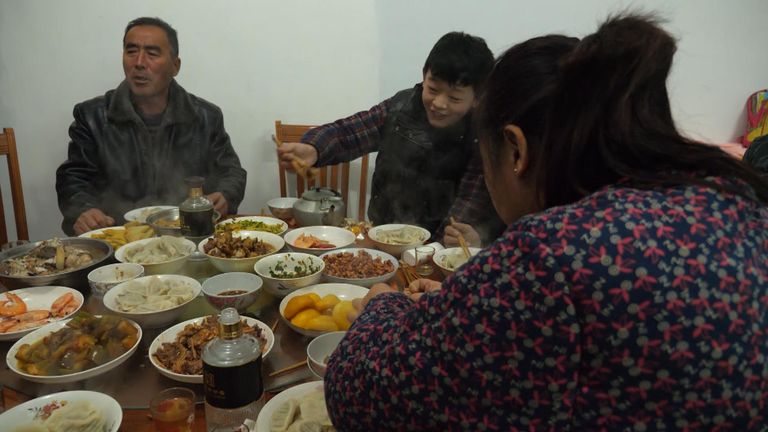 Three generations of the Yin family gathered to eat a traditional meal for the Lunar New Year