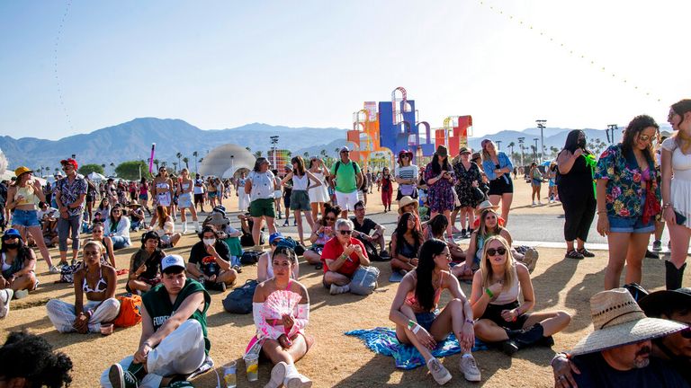 Festivalgoers are seen at the Coachella Music & Arts Festival at the Empire Polo Club on Sunday, April 24, 2022, in Indio, Calif. (Photo by Amy Harris/Invision/AP)