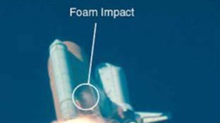Still from the video from the start showing the moment the foam hits the wing.  Image: NASA