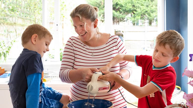 Sarah cooking with her children Freddie and Will