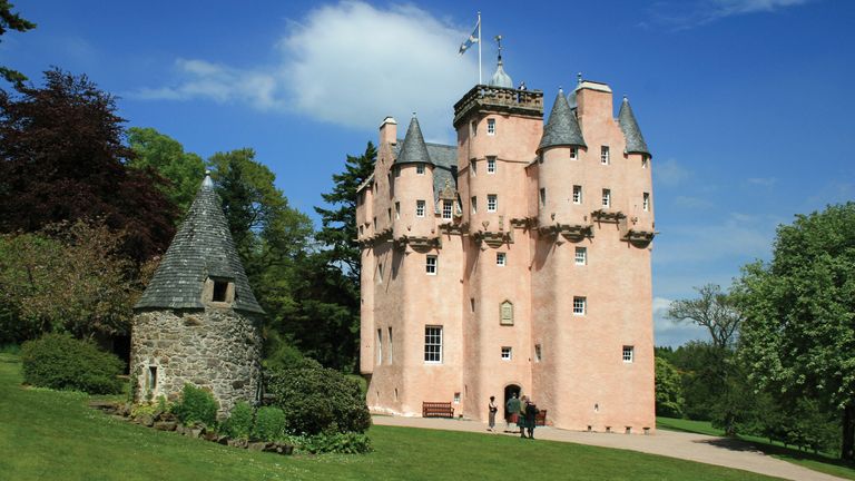 Undated handout photo issued by the National Trust for Scotland (NTS) of Craigievar Castle near Alford in Aberdeenshire. The "fairytale" castle said to have inspired Walt Disney&#39;s Cinderella castle has been swathed in pink mesh to protect it during a major conservation project. Work is beginning early this year to restore the pink harling and "futureproof" it against damage from rain and climate change. The completed work will be unveiled in 2024. Issue date: Monday January 30, 2023.