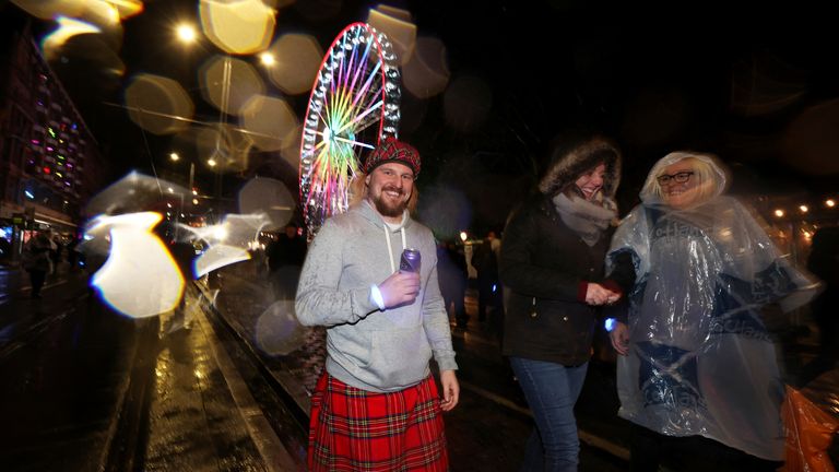 Revellers celebrate ahead of the New Year, in Edinburgh, Scotland, Britain December 31, 2022. REUTERS/Russell Cheyne