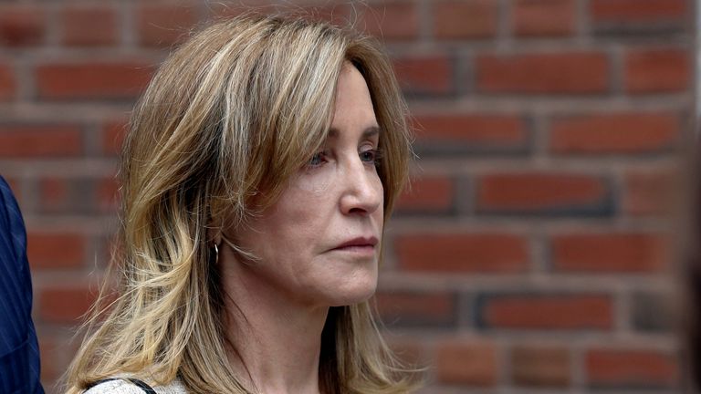 Felicity Huffman leaves courthouse in 2019