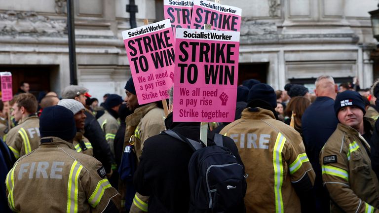  File Photo:Members of the Fire Brigades Union take part in a rally regarding possible future strike action linked to a pay dispute, in London, Britain, December 6, 2022