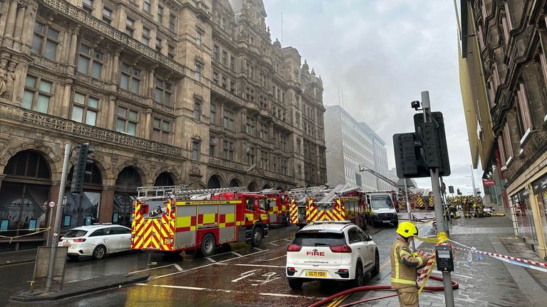 Firefighters tackle a blaze at the Jenners building in Edinburgh. The Scottish Fire and Rescue Service were called to fire at the former department store at 11.29am, and the building was found "well alight". A total of 10 fire appliances have been sent to the scene on Rose Street in the city centre. Picture date: Wednesday October 26, 2022.
