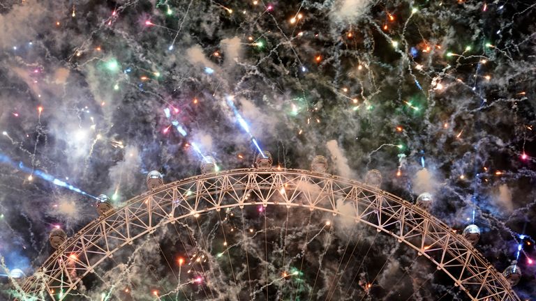 Fireworks light-up the sky over the London Eye in central London to celebrate the New Year on Sunday, Jan. 1, 2023. Pic: AP
